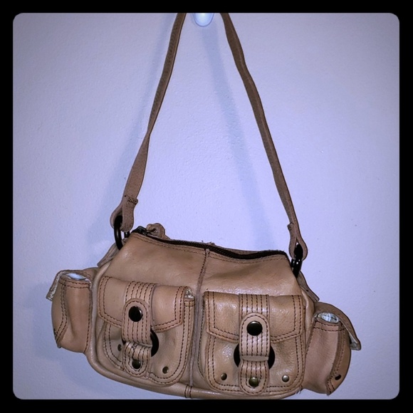 Fossil Handbags - Fossil purse with pouches and hang tag tan
